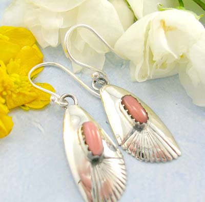 Asian jewelry shopping online sterling silver earrings in shell shape pattern design with an elliptical shape skin color imitation turquoise stone at center      