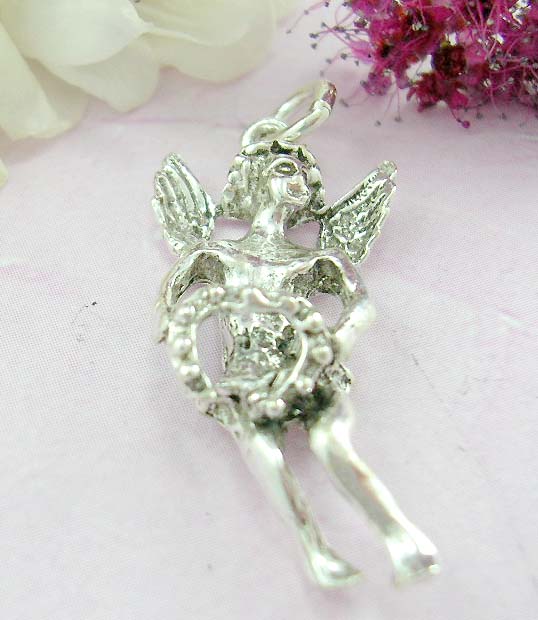 Holy angel collections jewelry shopping sterling silver pendant with angel holding a heart          