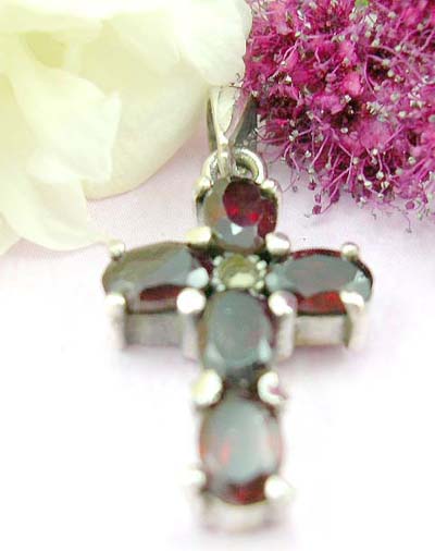 Erotic wholesale religious jewelry religious gift discount 4 oval shape red garnet stones forming cross pattern sterling silver pendant with a mini marcasite embedded in middle  